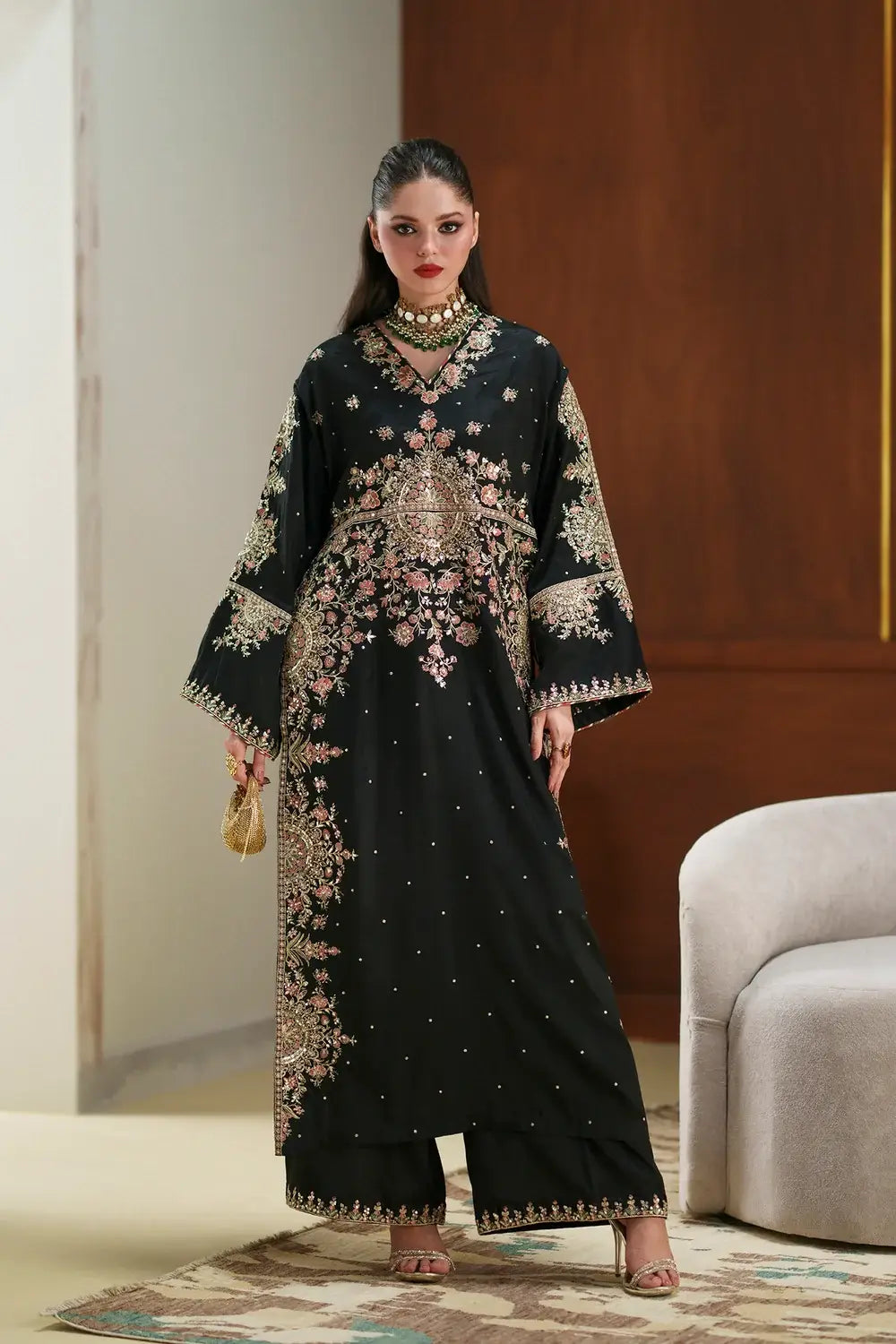 Front view of model wearing Ethnic Luxury Kaftan in shamoz silk with heavy spangle embroidery.