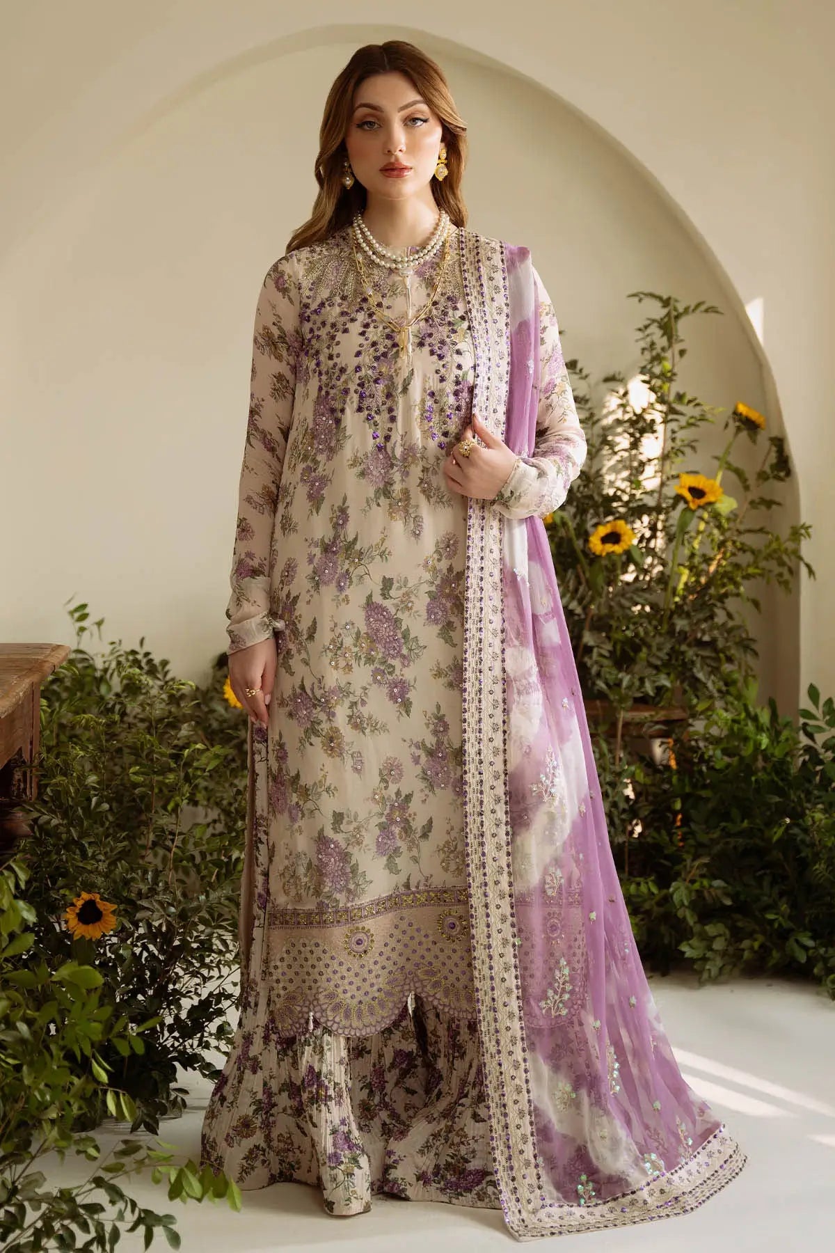 Front view of Nureh 3Pcs embroidered lawn dress in skin with matching dupatta by pkclothing.pk