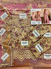Detailed view of printed dress and embroidered fabric border from Nureh 3Pcs lawn collection⁠