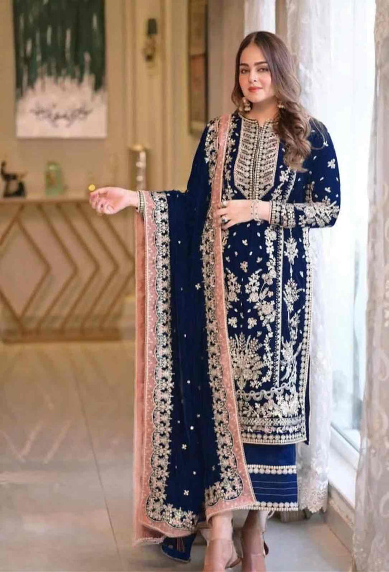 Model wearing Aneela navy blue embellished micro velvet wedding suit with embroidered dupatta from Pakiclothing