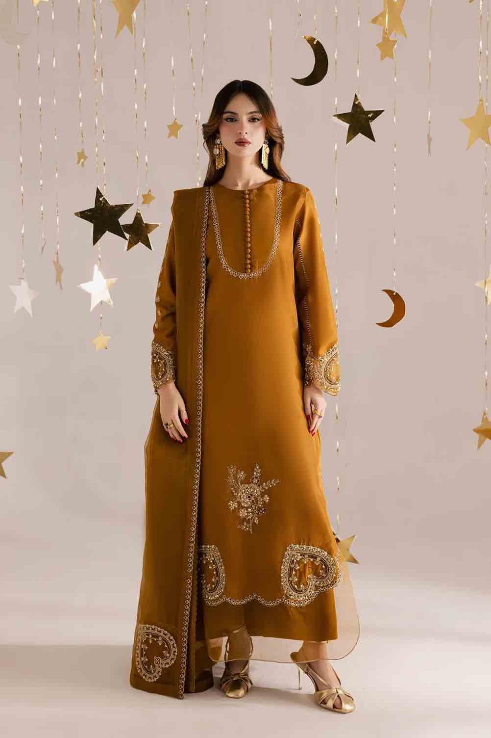 Front view of Nureh Luxury mustard yellow silk embroidered shirt with embellished neck, motif daman, and matching silk trousers – Buy Now